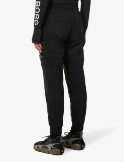 Stone Island Pocket Badge Tapered-leg Cotton-jersey Jogging Bottoms -Falkeis Store R04124575 BLACK ALT03